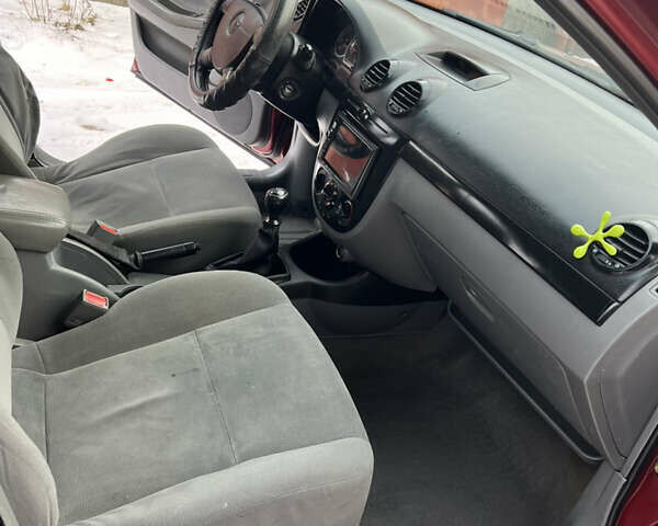 Красный Шевроле Лачетти, объемом двигателя 1.8 л и пробегом 219 тыс. км за 2699 $, фото 3 на Automoto.ua