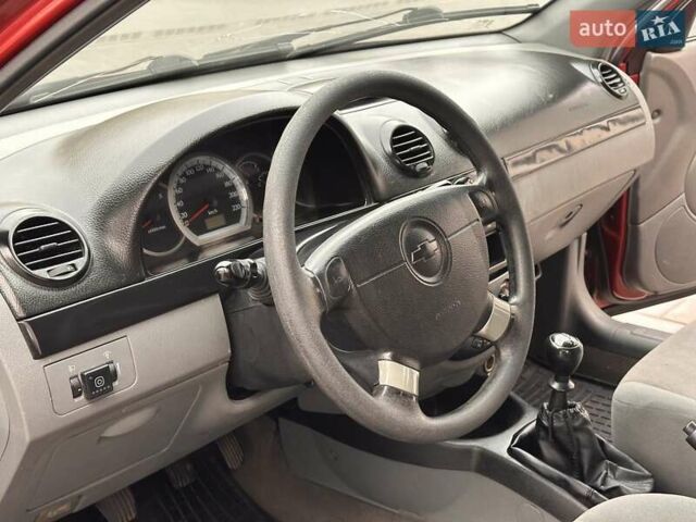 Красный Шевроле Лачетти, объемом двигателя 1.8 л и пробегом 220 тыс. км за 3300 $, фото 14 на Automoto.ua