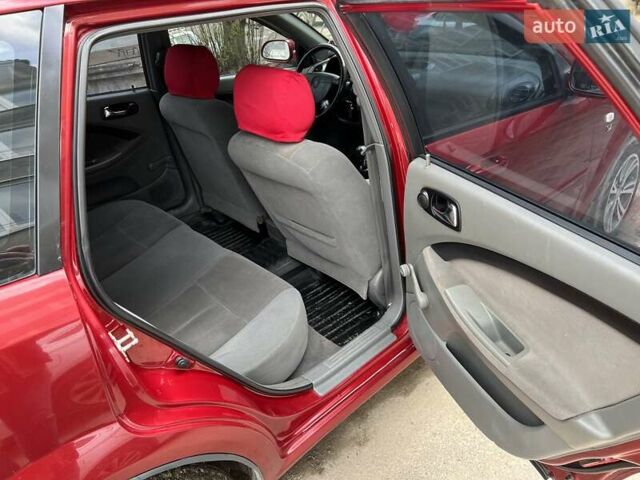 Красный Шевроле Лачетти, объемом двигателя 1.8 л и пробегом 251 тыс. км за 5500 $, фото 19 на Automoto.ua