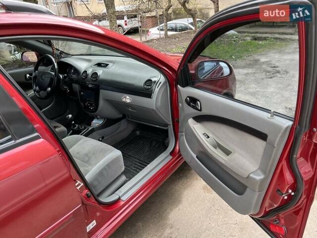 Красный Шевроле Лачетти, объемом двигателя 1.8 л и пробегом 251 тыс. км за 5500 $, фото 20 на Automoto.ua