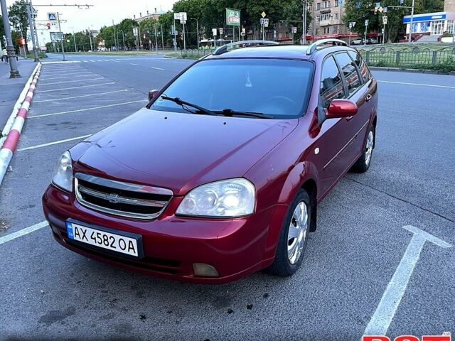 Красный Шевроле Лачетти, объемом двигателя 1.8 л и пробегом 280 тыс. км за 3900 $, фото 1 на Automoto.ua