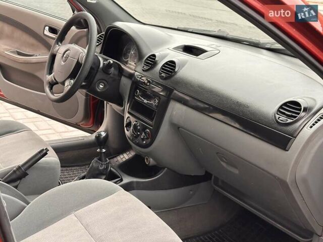 Красный Шевроле Лачетти, объемом двигателя 1.8 л и пробегом 220 тыс. км за 3300 $, фото 20 на Automoto.ua