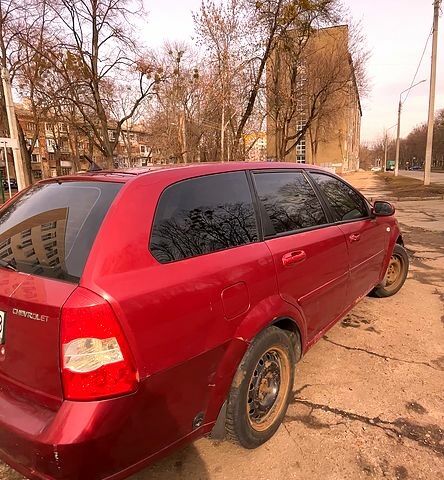 Красный Шевроле Лачетти, объемом двигателя 1.8 л и пробегом 307 тыс. км за 2350 $, фото 10 на Automoto.ua