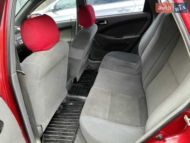 Красный Шевроле Лачетти, объемом двигателя 1.8 л и пробегом 251 тыс. км за 5500 $, фото 14 на Automoto.ua
