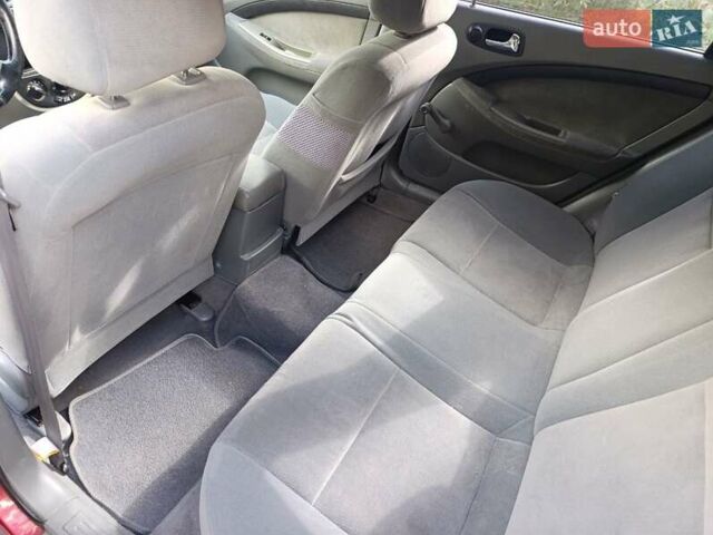 Красный Шевроле Лачетти, объемом двигателя 1.8 л и пробегом 173 тыс. км за 5300 $, фото 3 на Automoto.ua