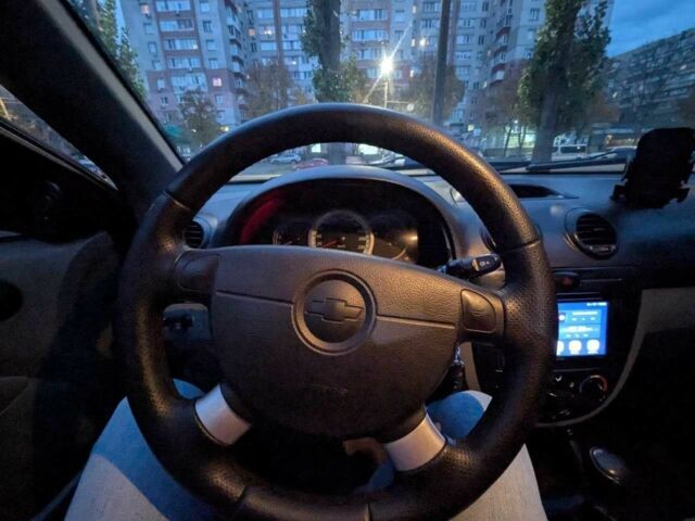 Красный Шевроле Лачетти, объемом двигателя 1.8 л и пробегом 269 тыс. км за 4200 $, фото 5 на Automoto.ua