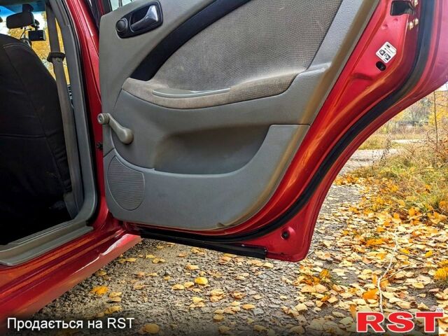 Красный Шевроле Лачетти, объемом двигателя 1.8 л и пробегом 177 тыс. км за 4800 $, фото 10 на Automoto.ua