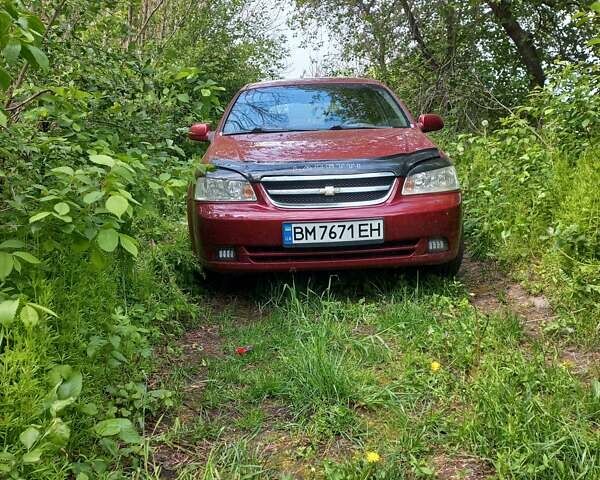 Красный Шевроле Лачетти, объемом двигателя 1.8 л и пробегом 280 тыс. км за 5100 $, фото 13 на Automoto.ua