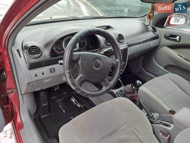 Красный Шевроле Лачетти, объемом двигателя 1.8 л и пробегом 280 тыс. км за 5100 $, фото 19 на Automoto.ua