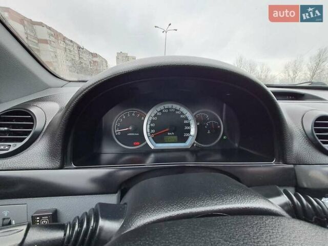 Красный Шевроле Лачетти, объемом двигателя 1.8 л и пробегом 280 тыс. км за 5100 $, фото 21 на Automoto.ua