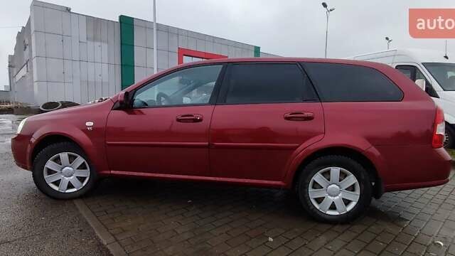 Красный Шевроле Лачетти, объемом двигателя 1.8 л и пробегом 235 тыс. км за 3900 $, фото 9 на Automoto.ua