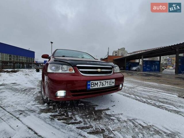 Красный Шевроле Лачетти, объемом двигателя 1.8 л и пробегом 280 тыс. км за 5100 $, фото 6 на Automoto.ua