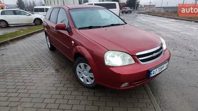 Красный Шевроле Лачетти, объемом двигателя 1.8 л и пробегом 235 тыс. км за 3900 $, фото 1 на Automoto.ua