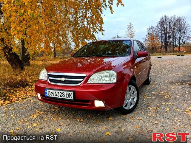 Красный Шевроле Лачетти, объемом двигателя 1.8 л и пробегом 177 тыс. км за 4800 $, фото 2 на Automoto.ua