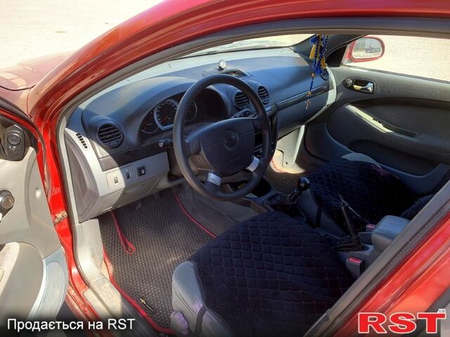 Красный Шевроле Лачетти, объемом двигателя 1.8 л и пробегом 250 тыс. км за 2750 $, фото 1 на Automoto.ua