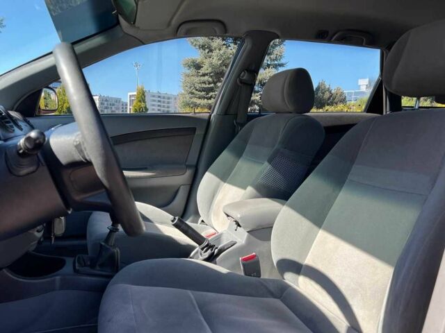 Красный Шевроле Лачетти, объемом двигателя 1.8 л и пробегом 107 тыс. км за 5400 $, фото 12 на Automoto.ua