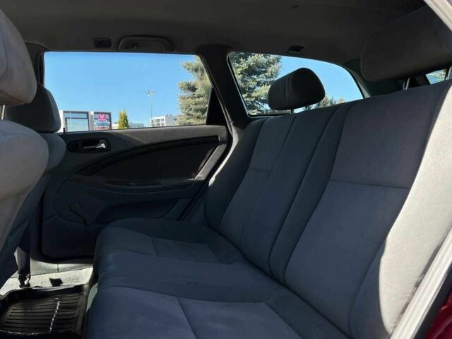 Красный Шевроле Лачетти, объемом двигателя 1.8 л и пробегом 107 тыс. км за 5400 $, фото 9 на Automoto.ua