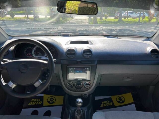 Красный Шевроле Лачетти, объемом двигателя 1.8 л и пробегом 107 тыс. км за 5400 $, фото 10 на Automoto.ua