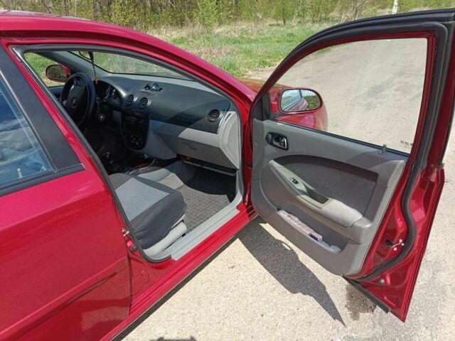 Красный Шевроле Лачетти, объемом двигателя 1.8 л и пробегом 104 тыс. км за 6100 $, фото 8 на Automoto.ua