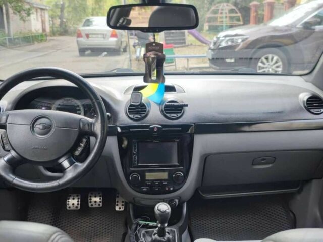 Красный Шевроле Лачетти, объемом двигателя 1.8 л и пробегом 343 тыс. км за 4300 $, фото 1 на Automoto.ua