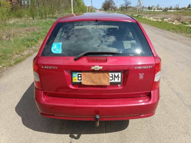 Красный Шевроле Лачетти, объемом двигателя 1.8 л и пробегом 104 тыс. км за 6100 $, фото 4 на Automoto.ua
