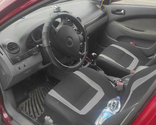 Красный Шевроле Лачетти, объемом двигателя 1.8 л и пробегом 248 тыс. км за 5800 $, фото 4 на Automoto.ua