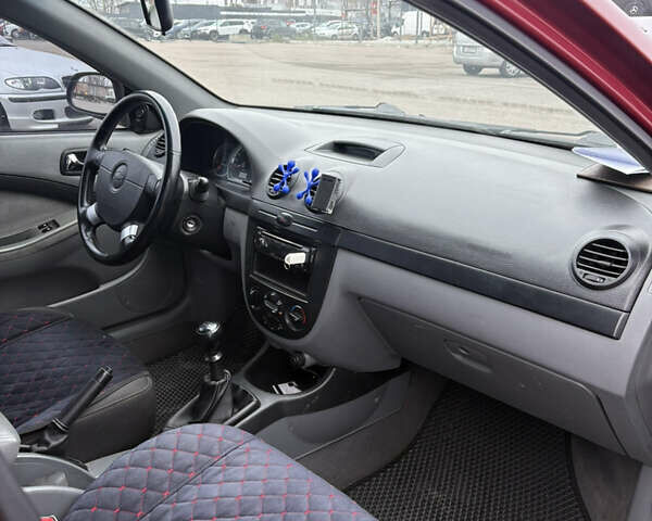 Красный Шевроле Лачетти, объемом двигателя 1.8 л и пробегом 220 тыс. км за 5600 $, фото 8 на Automoto.ua