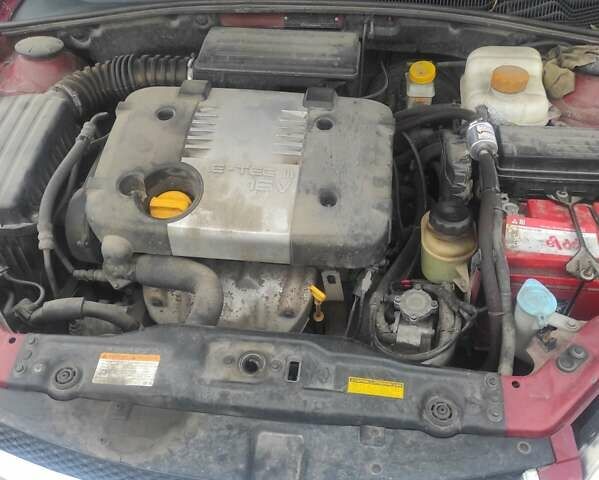 Красный Шевроле Лачетти, объемом двигателя 1.8 л и пробегом 248 тыс. км за 5800 $, фото 2 на Automoto.ua