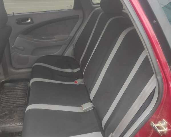 Красный Шевроле Лачетти, объемом двигателя 1.8 л и пробегом 248 тыс. км за 5800 $, фото 6 на Automoto.ua