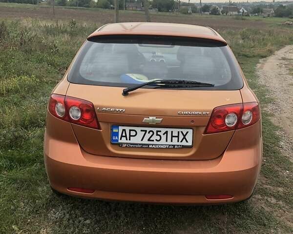 Желтый Шевроле Лачетти, объемом двигателя 1.8 л и пробегом 100 тыс. км за 4300 $, фото 9 на Automoto.ua