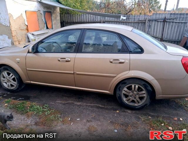 Желтый Шевроле Лачетти, объемом двигателя 1.8 л и пробегом 200 тыс. км за 2300 $, фото 3 на Automoto.ua