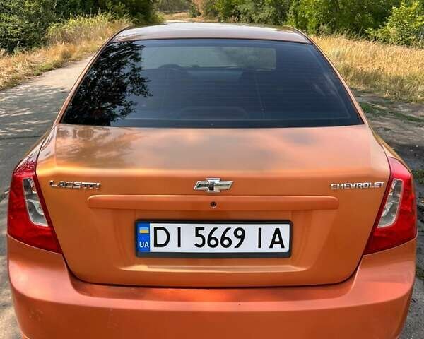 Желтый Шевроле Лачетти, объемом двигателя 1.8 л и пробегом 235 тыс. км за 3700 $, фото 3 на Automoto.ua