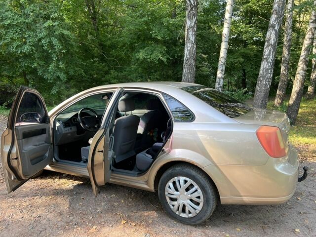 Желтый Шевроле Лачетти, объемом двигателя 1.4 л и пробегом 187 тыс. км за 4200 $, фото 14 на Automoto.ua