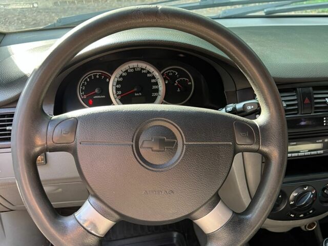 Желтый Шевроле Лачетти, объемом двигателя 1.4 л и пробегом 187 тыс. км за 4200 $, фото 11 на Automoto.ua