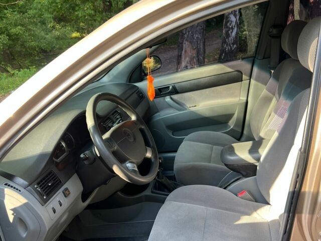 Желтый Шевроле Лачетти, объемом двигателя 1.4 л и пробегом 187 тыс. км за 4200 $, фото 12 на Automoto.ua