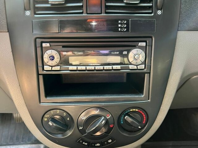 Желтый Шевроле Лачетти, объемом двигателя 1.4 л и пробегом 187 тыс. км за 4200 $, фото 13 на Automoto.ua