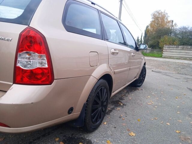 Желтый Шевроле Лачетти, объемом двигателя 1.6 л и пробегом 215 тыс. км за 4200 $, фото 14 на Automoto.ua