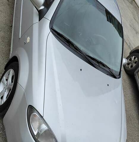 Серый Шевроле Лачетти, объемом двигателя 1.82 л и пробегом 187 тыс. км за 5000 $, фото 2 на Automoto.ua