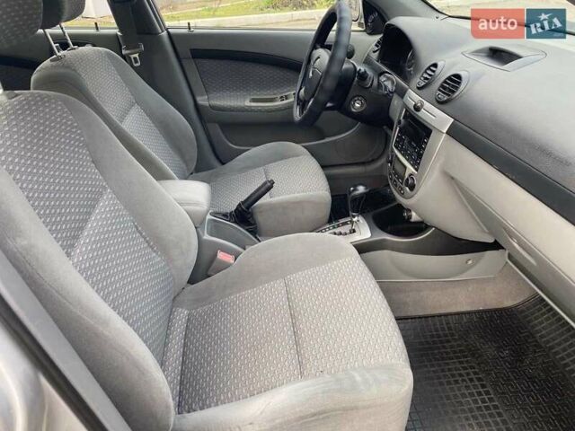 Сірий Шевроле Лачетті, об'ємом двигуна 1.8 л та пробігом 145 тис. км за 5800 $, фото 21 на Automoto.ua