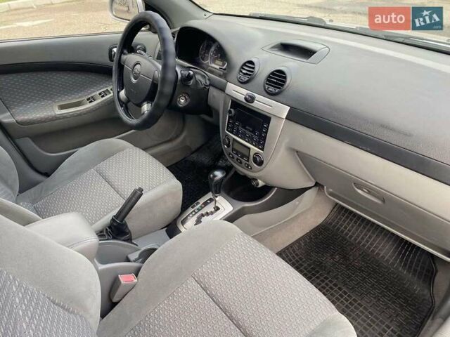 Сірий Шевроле Лачетті, об'ємом двигуна 1.8 л та пробігом 145 тис. км за 5800 $, фото 22 на Automoto.ua
