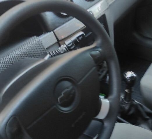 Серый Шевроле Лачетти, объемом двигателя 1.8 л и пробегом 287 тыс. км за 3200 $, фото 4 на Automoto.ua