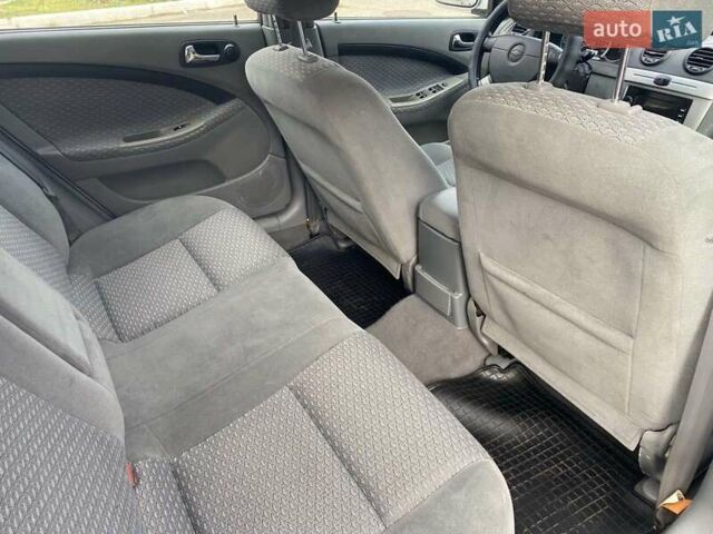 Сірий Шевроле Лачетті, об'ємом двигуна 1.8 л та пробігом 145 тис. км за 5800 $, фото 20 на Automoto.ua