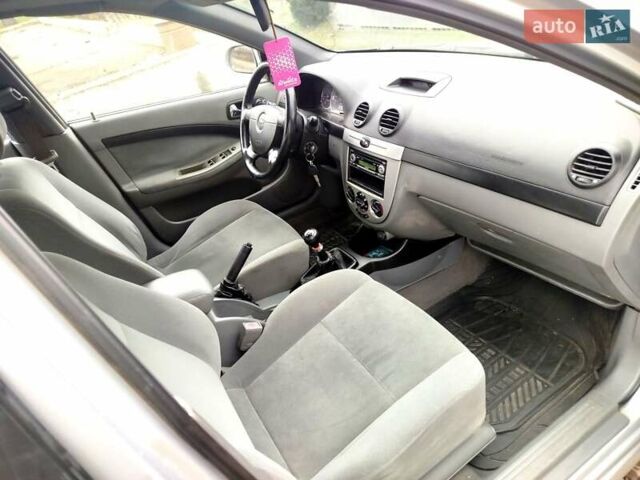 Серый Шевроле Лачетти, объемом двигателя 1.6 л и пробегом 259 тыс. км за 3900 $, фото 18 на Automoto.ua
