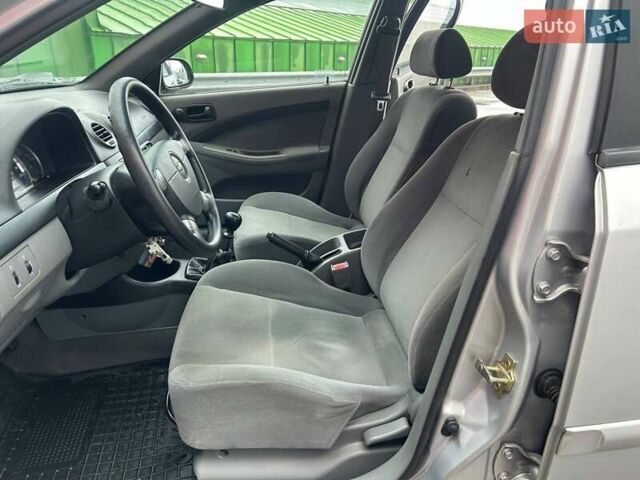 Серый Шевроле Лачетти, объемом двигателя 1.6 л и пробегом 144 тыс. км за 5290 $, фото 10 на Automoto.ua