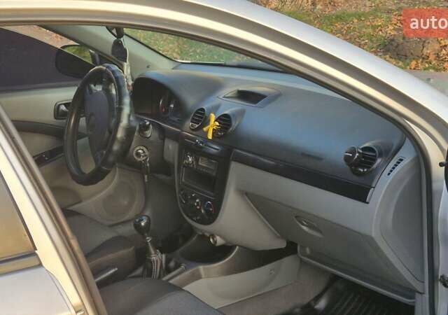 Серый Шевроле Лачетти, объемом двигателя 1.6 л и пробегом 217 тыс. км за 3950 $, фото 17 на Automoto.ua