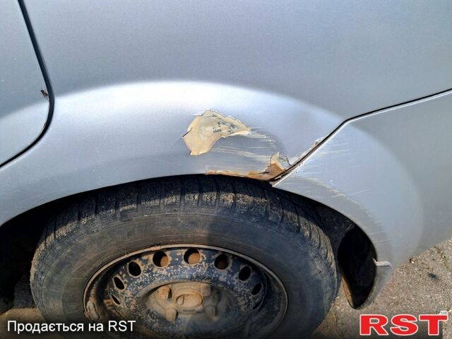 Серый Шевроле Лачетти, объемом двигателя 1.6 л и пробегом 280 тыс. км за 3300 $, фото 7 на Automoto.ua