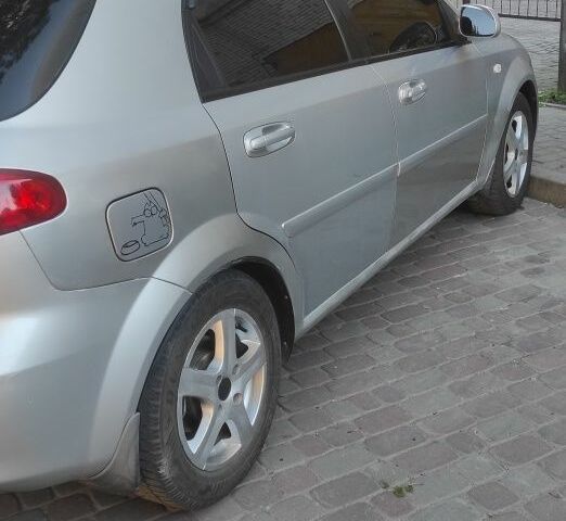 Серый Шевроле Лачетти, объемом двигателя 1.8 л и пробегом 287 тыс. км за 3200 $, фото 1 на Automoto.ua