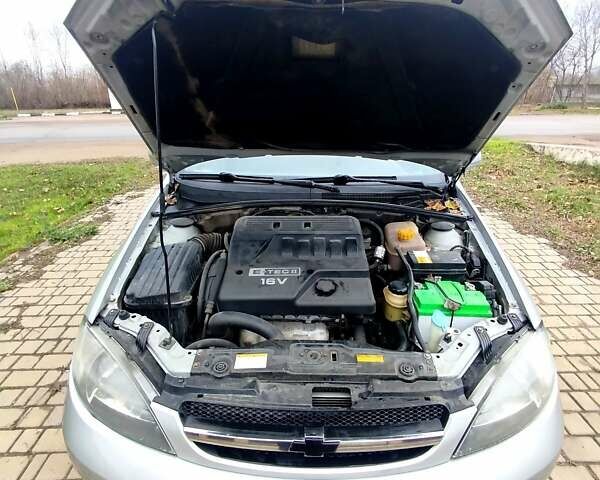 Серый Шевроле Лачетти, объемом двигателя 1.6 л и пробегом 259 тыс. км за 3900 $, фото 20 на Automoto.ua