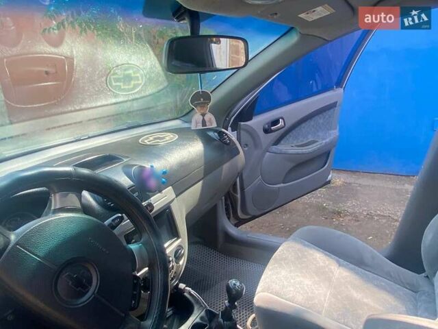 Серый Шевроле Лачетти, объемом двигателя 1.4 л и пробегом 314 тыс. км за 3700 $, фото 23 на Automoto.ua
