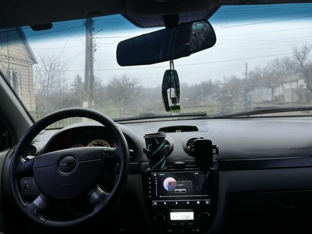 Серый Шевроле Лачетти, объемом двигателя 1.8 л и пробегом 250 тыс. км за 4600 $, фото 6 на Automoto.ua